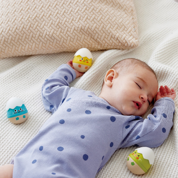 Stehauf-Rasseln: Spielerisches Entdecken für Babys
